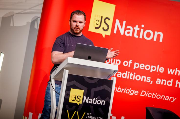 Eddy Vinck speaking at the podium at JSNation in Amsterdam