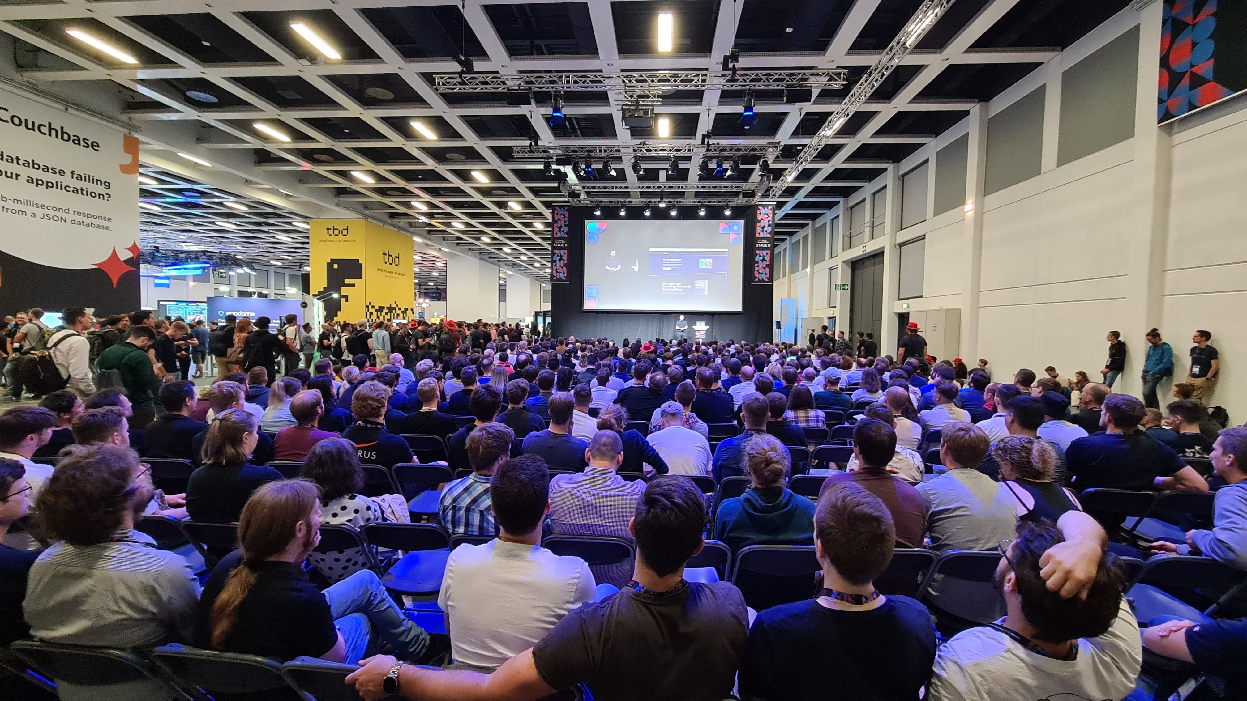 Eddy Vinck standing on stage at WeAreDevelopers World Congress in Berlin talking about Astro